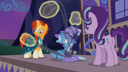 Size: 1920x1080 | Tagged: safe, screencap, character:starlight glimmer, character:sunburst, character:trixie, episode:uncommon bond, g4, my little pony: friendship is magic, bondage, cape, caravan, chains, clothing, epic fail, fail, hat, kidnapped, out of context, plot, struggling, trixie's cape, trixie's hat, trixie's wagon, wagon