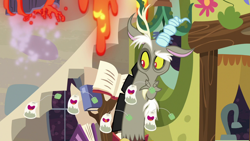 Size: 1280x720 | Tagged: safe, screencap, character:discord, episode:discordant harmony, g4, my little pony: friendship is magic, book, ginseng teabags, solo, volcano