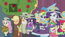 Size: 1272x716 | Tagged: safe, screencap, character:apple bloom, character:applejack, character:flash sentry, character:fluttershy, character:rainbow dash, character:rarity, character:twilight sparkle, character:twilight sparkle (scitwi), species:eqg human, episode:happily ever after party, g4, my little pony:equestria girls, bouquet, clothing, costume, flower, golden hazel, hard hat, hat, school play, tv-y