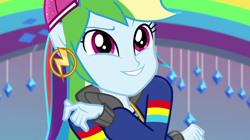 Size: 1912x1072 | Tagged: safe, screencap, character:rainbow dash, equestria girls:dance magic, equestria girls:mirror magic, g4, my little pony:equestria girls, backwards ballcap, baseball cap, cap, clothing, ear piercing, female, hat, hip hop, jacket, music video, outfit, piercing, ponied up, rapper, rapper dash, smiling, solo, stage