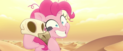 Size: 1920x804 | Tagged: safe, screencap, character:pinkie pie, species:earth pony, species:pony, my little pony: the movie (2017), arthropod, bone, bone dry desert, crazy face, crazy smile, creepy crawlies, dead, desert, desert sun madness, exhausted, faec, insanity, insect, messy mane, skeleton, skull, smiling, sweat, sweatdrop, tired, wide eyes, you know for kids