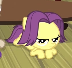 Size: 389x366 | Tagged: safe, screencap, character:banana peel, episode:for whom the sweetie belle toils, season 4, 5-year-old, annoyed, birthday, bored, female, filly, foal, lying down, plum star, table, waiting, wooden floor