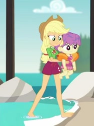 Size: 282x377 | Tagged: safe, screencap, character:applejack, episode:turf war, g4, my little pony:equestria girls, baby, background human, barefoot, belly button, clothing, cropped, feet, geode of super strength, lifeguard applejack, magical geodes, shorts, swimming trunks, water, water lily (equestria girls)