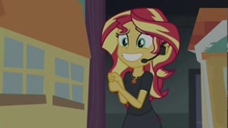 Size: 1280x720 | Tagged: safe, screencap, character:sunset shimmer, episode:opening night, g4, my little pony:equestria girls, amulet, fake smile, female, headset, solo, theater