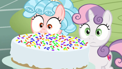 Size: 1600x900 | Tagged: safe, screencap, character:cozy glow, character:sweetie belle, episode:marks for effort, g4, my little pony: friendship is magic, cake, female, filly, food, sprinkles, sugarcube corner, surprised