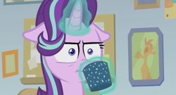 Size: 811x439 | Tagged: safe, screencap, character:starlight glimmer, species:pony, species:unicorn, episode:marks for effort, g4, my little pony: friendship is magic, :i, cup, empathy cocoa, faec, floppy ears, glowing horn, i mean i see, reaction image, solo, unamused