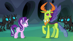 Size: 1280x720 | Tagged: safe, screencap, character:starlight glimmer, character:thorax, species:changeling, species:pony, species:reformed changeling, species:unicorn, episode:to where and back again, g4, my little pony: friendship is magic, changeling hive, changeling king, changeling kingdom, female, male, mare, raised hoof