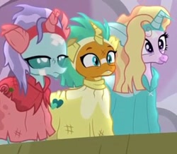 Size: 404x353 | Tagged: safe, screencap, character:ocellus, character:silverstream, character:smolder, species:changeling, species:dragon, species:hippogriff, species:reformed changeling, episode:horse play, g4, my little pony: friendship is magic, clothing, costume, cropped, dragoness, fake ears, fake horn, female, ocellus is not amused, trio, varying degrees of want, wig