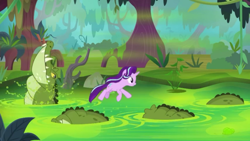 Size: 1280x720 | Tagged: safe, screencap, character:starlight glimmer, species:pony, species:unicorn, episode:on the road to friendship, animal, crocodile, female, jumping, mare, solo, swamp, water