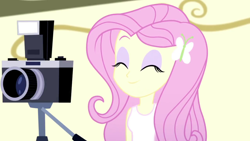 Size: 1280x720 | Tagged: safe, screencap, character:fluttershy, episode:pet project, eqg summertime shorts, g4, my little pony:equestria girls, camera, cute, eyes closed, shyabetes, solo