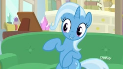 Size: 1920x1080 | Tagged: safe, screencap, character:trixie, species:pony, species:unicorn, episode:on the road to friendship, couch, discovery family logo, female, mare, sitting, smiling, solo