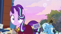 Size: 1920x1080 | Tagged: safe, screencap, character:starlight glimmer, character:trixie, species:pony, species:unicorn, episode:on the road to friendship, card, clothing, crying, discovery family logo, duo, female, mare, robe, wide eyes