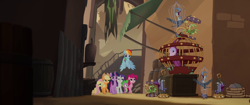 Size: 1920x804 | Tagged: safe, screencap, character:applejack, character:fluttershy, character:pinkie pie, character:rainbow dash, character:rarity, character:spike, character:twilight sparkle, character:twilight sparkle (alicorn), species:alicorn, species:bird, species:dragon, species:pony, my little pony: the movie (2017), birdcage, cage, female, klugetown, mane seven, mane six, mare, slavery