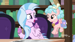 Size: 1920x1080 | Tagged: safe, screencap, character:cozy glow, character:silverstream, species:hippogriff, species:pegasus, species:pony, episode:school raze, g4, my little pony: friendship is magic, chair, duo, duo female, female, filly, flying, foal, happy, library, pencil, sitting