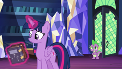 Size: 1280x720 | Tagged: safe, screencap, character:spike, character:twilight sparkle, character:twilight sparkle (alicorn), species:alicorn, species:dragon, species:pony, episode:father knows beast, g4, my little pony: friendship is magic, book, library, twilight's castle, twilight's castle library, winged spike