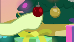 Size: 1280x720 | Tagged: safe, screencap, character:sandbar, species:earth pony, species:pony, episode:the hearth's warming club, g4, my little pony: friendship is magic, christmas, christmas tree, disembodied hoof, hearth's warming tree, holiday, male, offscreen character, ornament, present, solo, teenager, tree