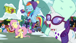 Size: 1280x720 | Tagged: safe, screencap, character:berry punch, character:berryshine, character:burnt oak, character:caramel, character:fluttershy, character:rainbow dash, character:rarity, species:pegasus, species:pony, species:unicorn, episode:best gift ever, g4, my little pony: friendship is magic, clothing, eyes closed, female, hat, mare, raised hoof, scarf, singing, snow, sweater