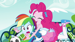 Size: 1920x1080 | Tagged: safe, screencap, character:pinkie pie, character:rainbow dash, equestria girls:forgotten friendship, g4, my little pony:equestria girls, clothing, cute, eyes closed, female, football, glomp, hairclip, happy, hug, open mouth, out of context, photo, sandals, shirt, smiling, sports, surprised, wristband