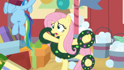 Size: 1920x1080 | Tagged: safe, screencap, character:fluttershy, character:rainbow dash, species:pegasus, species:pony, episode:the great escape room, bucket, hearth's warming shorts, solo focus, standing, standing on one leg, wreath