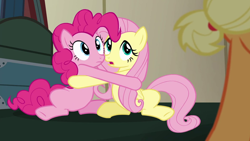 Size: 1050x591 | Tagged: safe, screencap, character:applejack, character:fluttershy, character:pinkie pie, species:earth pony, species:pegasus, species:pony, episode:buckball season, g4, my little pony: friendship is magic, cute, female, hug, mare, out of context, shipping fuel