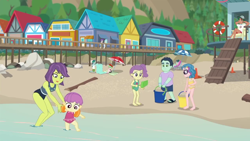 Size: 1280x720 | Tagged: safe, screencap, character:captain planet, character:drama letter, character:timber spruce, character:victoria, character:watermelody, episode:turf war, g4, my little pony:equestria girls, baby, background human, barefoot, beach, bikini, clothing, feet, female, legs, lifeguard timber, lily pad (equestria girls), male, midriff, mint chip, one-piece swimsuit, sandals, smiling, swimsuit, technicolor waves, victoria, water lily (equestria girls)