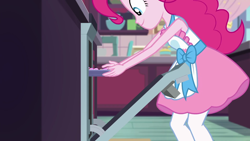 Size: 1280x720 | Tagged: safe, screencap, character:pinkie pie, episode:the craft of cookies, g4, my little pony:equestria girls, apron, baking, clothing, oven, photo, solo
