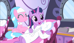 Size: 1317x767 | Tagged: safe, screencap, character:aloe, character:twilight sparkle, character:twilight sparkle (alicorn), species:alicorn, species:pony, episode:rarity's biggest fan, alternate hairstyle, bathrobe, clothing, duo, female, mane styling, mare, reclining, robe, sitting, smiling