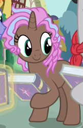 Size: 395x606 | Tagged: safe, screencap, character:cocoa candy, species:pony, species:unicorn, episode:fame and misfortune, g4, my little pony: friendship is magic, background pony, book, cropped, female, friendship journal, mare, solo