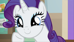 Size: 1666x938 | Tagged: safe, screencap, character:rarity, species:pony, species:unicorn, episode:friendship university, g4, my little pony: friendship is magic, close-up, cute, eye shimmer, female, mare, raised hoof, raribetes, smiling, solo