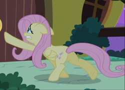 Size: 1289x933 | Tagged: safe, screencap, character:fluttershy, species:pegasus, species:pony, episode:luna eclipsed, g4, my little pony: friendship is magic, cropped, female, floppy ears, mare, raised hoof, reaching, rear view, solo, struggling, teeth