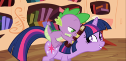 Size: 1666x816 | Tagged: safe, screencap, character:spike, character:twilight sparkle, character:twilight sparkle (unicorn), species:dragon, species:pony, species:unicorn, episode:the cutie pox, g4, my little pony: friendship is magic, book, cropped, dragons riding ponies, duo, female, golden oaks library, lidded eyes, male, mare, out of context, riding, smiling