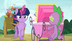 Size: 1280x720 | Tagged: safe, screencap, character:spike, character:twilight sparkle, character:twilight sparkle (alicorn), species:alicorn, species:dragon, species:pony, episode:a flurry of emotions, g4, my little pony: friendship is magic, baby bottle, claws, doll, female, glowing horn, male, mare, toy