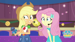 Size: 1920x1080 | Tagged: safe, screencap, character:applejack, character:fluttershy, episode:best in show: the victory lap, g4, my little pony:equestria girls, geode of fauna, geode of super strength, headset, magical geodes, microphone