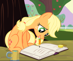 Size: 887x740 | Tagged: safe, screencap, character:applejack, species:earth pony, species:pony, episode:leap of faith, g4, my little pony: friendship is magic, apple tree, bits, book, cropped, cup, cute, female, freckles, friendship journal, holding, mare, mouth hold, pencil, sitting, smiling, solo, tree, writing