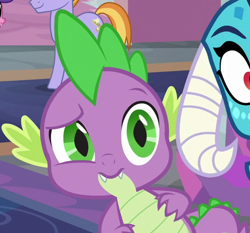 Size: 582x542 | Tagged: safe, screencap, character:princess ember, character:spike, species:dragon, episode:school daze, g4, my little pony: friendship is magic, baby, baby dragon, claws, cropped, dragoness, fangs, female, horns, male, offscreen character, raised eyebrow, solo focus