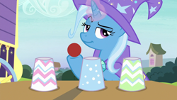 Size: 1280x720 | Tagged: safe, screencap, character:trixie, species:pony, episode:uncommon bond, g4, my little pony: friendship is magic, ball, cup, glowing horn, hoof hold, lidded eyes, magic trick, smiling, smirk, solo