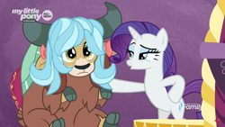 Size: 1366x768 | Tagged: safe, screencap, character:rarity, character:yona, species:pony, species:unicorn, species:yak, episode:she's all yak, g4, my little pony: friendship is magic, beautiful, bipedal, blue hair, cloven hooves, cute, discovery family logo, duo, eyeshadow, female, fit right in, frown, hair bow, hoof on hip, horns, lidded eyes, makeup, mare, mentor and protege, monkey swings, raised eyebrow, singing, sitting, teenager, waiting, wig, yonadorable