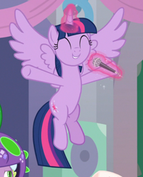 Size: 562x697 | Tagged: safe, screencap, character:spike, character:twilight sparkle, character:twilight sparkle (alicorn), species:alicorn, species:dragon, species:pony, episode:she's all yak, g4, my little pony: friendship is magic, clothing, costume, cropped, cute, eyes closed, flying, glowing horn, horn, levitation, magic, microphone, offscreen character, smiling, solo focus, spread wings, t pose, telekinesis, twiabetes, winged spike, wings