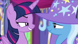 Size: 1136x640 | Tagged: safe, screencap, character:trixie, character:twilight sparkle, character:twilight sparkle (alicorn), species:alicorn, species:pony, species:unicorn, episode:no second prances, g4, my little pony: friendship is magic, cape, clothing, duo, fake smile, female, folded wings, forced smile, grin, hat, lidded eyes, long time no see, mare, narrowed eyes, rivalry, smiling, suspicious, trixie's cape, trixie's hat, twilight's castle, wings