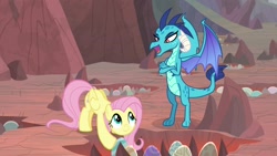 Size: 1920x1080 | Tagged: safe, screencap, character:fluttershy, character:princess ember, species:pegasus, species:pony, episode:sweet and smoky, g4, my little pony: friendship is magic, amused, claws, crossed arms, dragon egg, dragon lands, egg, female, folded wings, horns, lidded eyes, looking up, mare, open mouth, smiling, wings