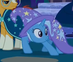 Size: 384x322 | Tagged: safe, screencap, character:sunburst, character:trixie, species:pony, species:unicorn, episode:student counsel, cape, clothing, cropped, female, hat, male, mare, meme origin, smiling, stallion, trixie's cape, trixie's hat