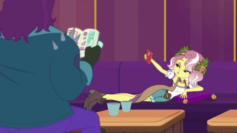 Size: 800x450 | Tagged: safe, screencap, character:vignette valencia, episode:inclement leather, g4, my little pony:equestria girls, animated, background human, cellphone, couch, cup, female, gif, inclement leather: vignette valencia, legs, peace sign, phone, pillow, pose, rift axe, seductive pose, selfie, side, sitting up, smartphone, smiling, table, taking pictures, vignette valencia