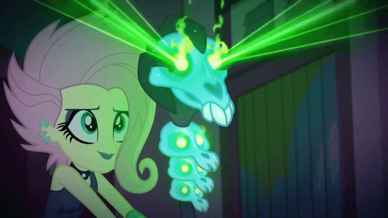 Size: 800x450 | Tagged: safe, screencap, character:fluttershy, episode:the road less scheduled, g4, my little pony:equestria girls, animated, choker, ear piercing, earring, eyeliner, eyeshadow, fire, flutterpunk, gif, glowing eyes, goth, green light, jewelry, laser, lipstick, makeup, metalshy, piercing, skull, sleeveless, solo, staff, the road less scheduled: fluttershy