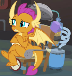 Size: 636x672 | Tagged: safe, screencap, character:smolder, species:dragon, episode:a horse shoe-in, g4, my little pony: friendship is magic, claws, cropped, crossed arms, crossed legs, dragoness, fangs, female, horns, invention, kid, laboratory, raised eyebrow, solo, spread wings, teenaged dragon, teenager, toes, unimpressed, wings