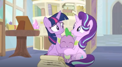 Size: 1801x993 | Tagged: safe, screencap, character:spike, character:starlight glimmer, character:twilight sparkle, character:twilight sparkle (alicorn), species:alicorn, species:dragon, species:pony, species:unicorn, episode:a horse shoe-in, g4, my little pony: friendship is magic, cute, hug, scroll, spikabetes, winged spike