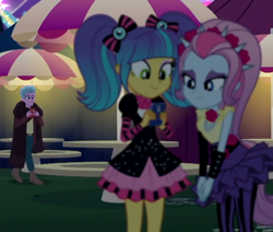 Size: 1020x866 | Tagged: safe, screencap, equestria girls:sunset's backstage pass, g4, my little pony:equestria girls, cellphone, clothing, cool scarf guy, cropped, female, male, miniskirt, outdoors, pantyhose, phone, picnic table, pigtails, pixel pizazz, skirt, smartphone, spiked headband, table, the snapshots, twintails, umbrella, violet blurr