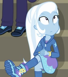 Size: 641x723 | Tagged: safe, screencap, character:trixie, episode:sock it to me, g4, my little pony:equestria girls, background human, bleachers, clothing, crossed legs, cute, diatrixes, female, hoodie, legs, looking up, male, marco dafoy, sock it to me: trixie, solo, suspicious