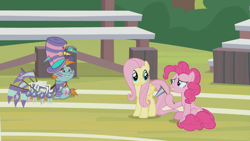 Size: 1366x768 | Tagged: safe, screencap, character:fluttershy, character:pinkie pie, character:snips, species:pony, episode:2-4-6 greaaat, bleachers, clothing, face paint, fake smile, field, flag, hat, outdoors, photos, top hat