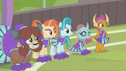 Size: 1366x768 | Tagged: safe, screencap, character:lighthoof, character:ocellus, character:shimmy shake, character:smolder, character:yona, species:changedling, species:changeling, species:dragon, species:pony, species:reformed changeling, species:yak, episode:2-4-6 greaaat, cheerleader, cheerleader ocellus, cheerleader outfit, cheerleader smolder, cheerleader yona, clothing, cloven hooves, dragoness, female, fence, field, happy, mare, monkey swings, pleated skirt, pom pom, ponytail, skirt, smiling