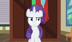 Size: 854x498 | Tagged: safe, screencap, character:rarity, species:pony, species:unicorn, episode:dragon dropped, g4, my little pony: friendship is magic, cape, clothing, crate, post office, rarity is not amused, unamused